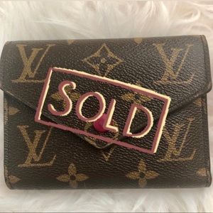 Louis Vuitton Victorine wallet in fuchsia
